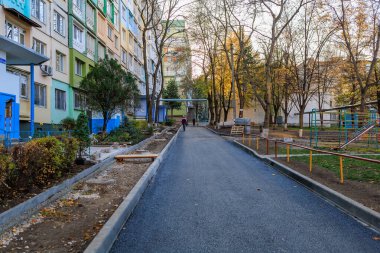 Repair of intra-yard or intra-quarter roads, background. November 3, 2022 Beltsy Moldova