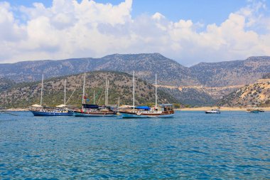 August 10, 2022 Demre, Antalya province, Turkey. Yachts off the Mediterranean coast. Background with copy space for text