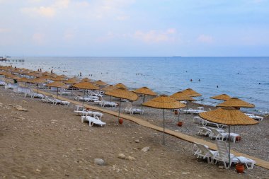 August 11, 2022 Beldibi, Kemer district, Antalya Province, Turkey. City public beach. Background with copy space for text