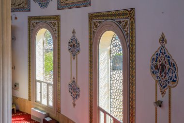 Interior in the mosque HUZUR. City landmark open to tourists. Classic Islamic background. August 9, 2022 Kemer, Antalya province, Turkey.