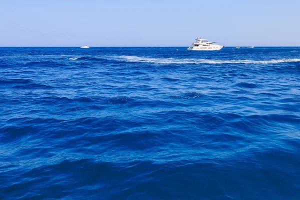 Yacht or boat on the high seas. Background with copy space. August 9, 2022 Kemer, Antalya province, Turkey.