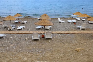 August 11, 2022 Beldibi, Kemer district, Antalya Province, Turkey. City public beach. Background with copy space for text