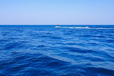 Yacht or boat on the high seas. Background with copy space. August 9, 2022 Kemer, Antalya province, Turkey.