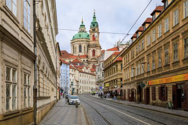 August 22, 2022 Prague, Czech Republic. Street of the tourist part of the city with tram tracks. Background with selective focus and copy space for text