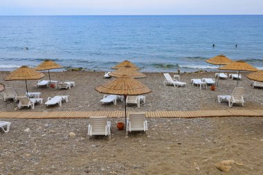 August 11, 2022 Beldibi, Kemer district, Antalya Province, Turkey. City public beach. Background with copy space for text