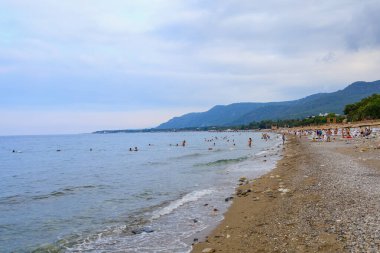 August 11, 2022 Beldibi, Kemer district, Antalya Province, Turkey. City public beach. Background with copy space for text