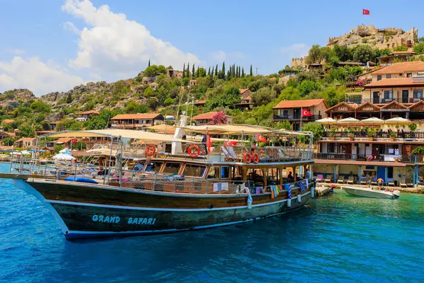 August 10, 2022 Demre, Antalya province, Turkey. Yachts near the Turkish rocky shore. Background with copy space for text
