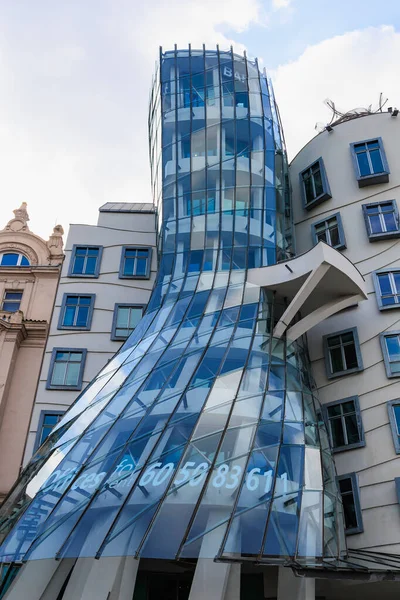 August 26, 2022 Prague, Czech Republic. Dancing House. Famous and popular place among tourists. City landmark of Prague. Travel background