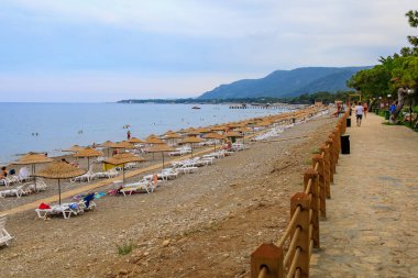 August 11, 2022 Beldibi, Kemer district, Antalya Province, Turkey. City public beach. Background with copy space for text