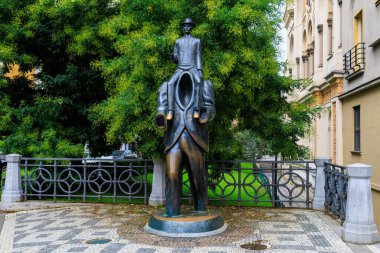 Monument to Franz Kafka, sculptor Yaroslav Rona. German-speaking Bohemian writer, a key figure in the literature of the early 20th century. August 25, 2022 Prague, Czech Republic.