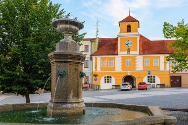 August 25, 2022 Votice Czech Republic. Fountain in a cozy European town. Background with selective focus and copy space
