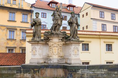 August 24, 2022 Prague, Czech Republic. Antique sculptures on the Charles Bridge. Background with copy space