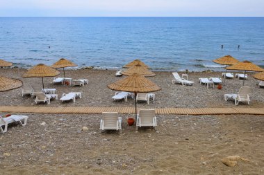 August 11, 2022 Beldibi, Kemer district, Antalya Province, Turkey. City public beach. Background with copy space for text