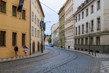 August 23, 2022 Prague, Czech Republic. Street of the tourist part of the city with tram tracks. Background with selective focus and copy space for text