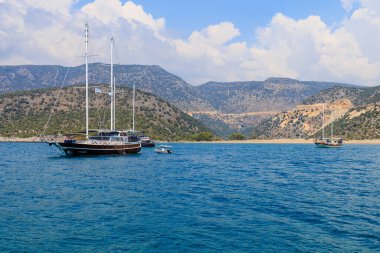 August 10, 2022 Demre, Antalya province, Turkey. Yachts off the Mediterranean coast. Background with copy space for text