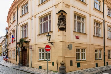 August 25, 2022 Prague, Czech Republic. Ancient sculpture in urban architecture. Background with selective focus and copy space