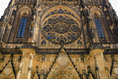 Round window. Details of the exterior of the Gothic Catholic Cathedral of St. Vitus, Wenceslas and Vojtech in Prague Castle. Background with selective focus and copy space