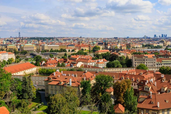 Roofs of houses and a view of the city of Prague. Background with selective focus and copy space for text