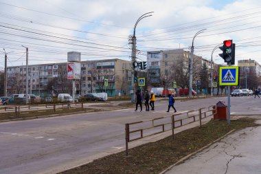 January 14, 2022 Balti Moldova. Pedestrian crossing with traffic lights in the city. Background