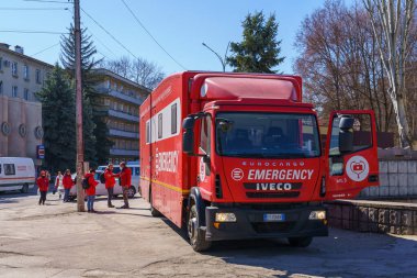 March 28, 2022 Balti Moldova Mobile hospital on wheels. Red ambulance truck.