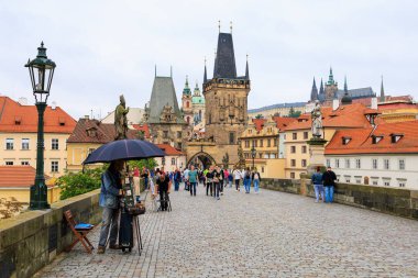 August 24, 2022 Prague, Czech Republic. Pedestrian Charles Bridge. Background with copy space for text.