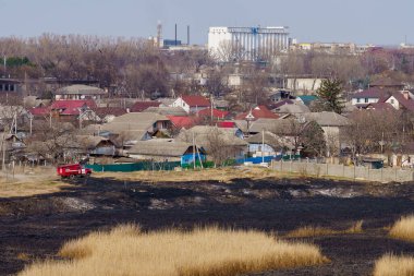 March 29, 2022 Balti Moldova. Editorial background for news. Burnt reeds after a fire near the village