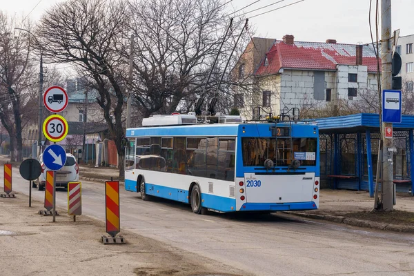 stock image February 1, 2022 Balti Moldova. Wireless trolleybus on a city street during street repairs