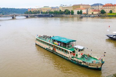 August 24, 2022 Prague, Czech Republic. Pleasure boat on the Vltava river. Background with selective focus and copy space for text