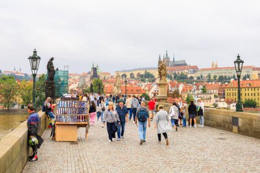 August 24, 2022 Prague, Czech Republic. Antique sculptures on the Charles Bridge. Background with copy space