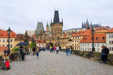 August 24, 2022 Prague, Czech Republic. Pedestrian Charles Bridge. Background with copy space for text.