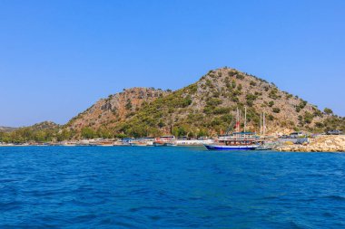 August 10, 2022 Demre, Antalya province, Turkey. Yachts off the Mediterranean coast. Background with copy space for text