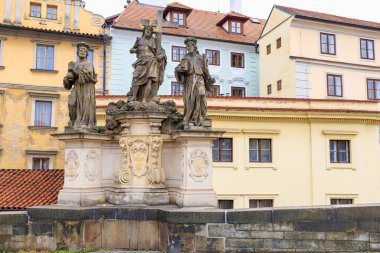 August 24, 2022 Prague, Czech Republic. Antique sculptures on the Charles Bridge. Background with copy space