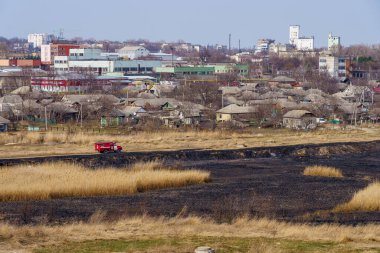 March 29, 2022 Balti Moldova. Editorial background for news. Burnt reeds after a fire near the village