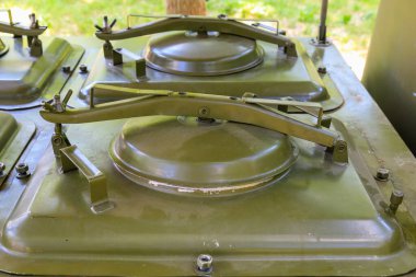 Military stove in the field kitchen for cooking hot food for soldiers.