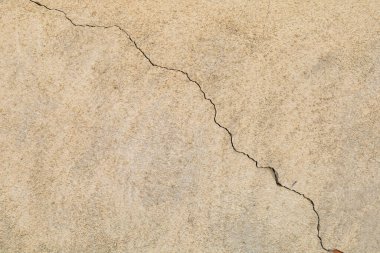 Binanın alçısında bir çatlak. Arkaplan ya da fon. Tasarım için boşluk