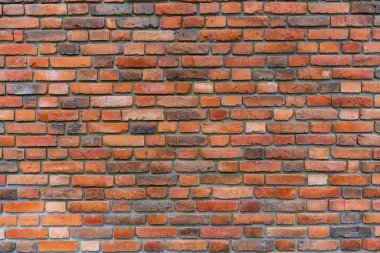 Güzel, pürüzlü tuğla duvar yüzeyi. Arkaplan ya da fon. Tasarım için boşluk