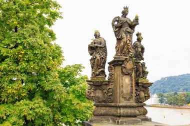 August 24, 2022 Prague, Czech Republic. Antique sculptures on the Charles Bridge. Background with copy space