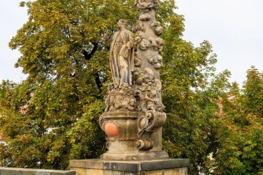 August 24, 2022 Prague, Czech Republic. Antique sculptures on the Charles Bridge. Background with copy space