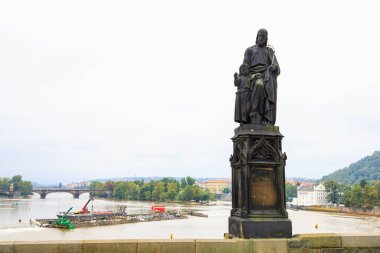 August 24, 2022 Prague, Czech Republic. Antique sculptures on the Charles Bridge. Background with copy space