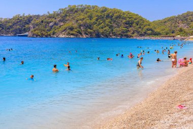11 Ağustos 2023 Oludeniz Turkey. Resimli editör kullanımı için. Meşhur popüler Oludeniz plajı
