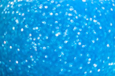 Bulanık arkaplan. Odaklanmamış fotoğraf merceğini geri ver. Arka plan bokeh. Tasarım boş. Tasarımcı için grafik kaynak. Canlı mavi.