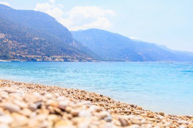 Oludeniz sahilinden deniz ve dağların manzarası, mavi göl. Mavi bayrağı olan en temiz sahil. Arkaplan