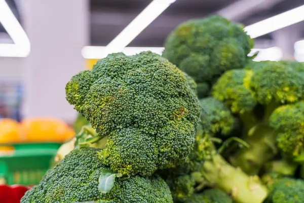Broccoli. Healthy food in the market. Diets and proper nutrition. Background with selective focus and copy space