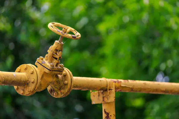Gas pipe valve. Background with selective focus and copy space