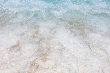 Oludeniz sahilinde küçük beyaz çakıl taşları sahili, mavi lagün. Mavi bayrağı olan en temiz sahil. Arkaplan