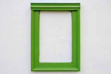 Beyaz arkaplanı olan yeşil bir çerçeve. Çerçeve boş