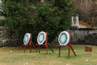 Outdoor archery targets in forested area for practice. clipart