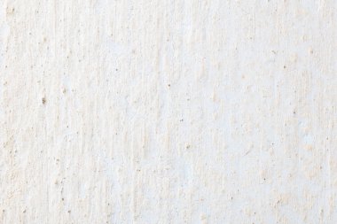 İnce desenleri ve doğal kusurları olan beyaz desenli duvarlara yakın plan..