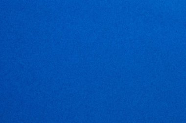 Beyaz noktaların etrafa saçıldığı mavi bir arka plan. Arkaplanın mavi rengi canlı, desenli origami kağıt arkaplanıdır