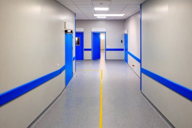 Corridor in a modern hospital. Background with selective focus and copy space for text